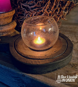 Houten ronde plank met windlicht